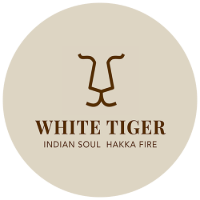 logo design for White Tiger restaurant featuring Indian soul and Hakka fire cuisine with a minimalist lion face representation